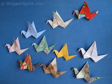 origami flapping birds made with recycled paper