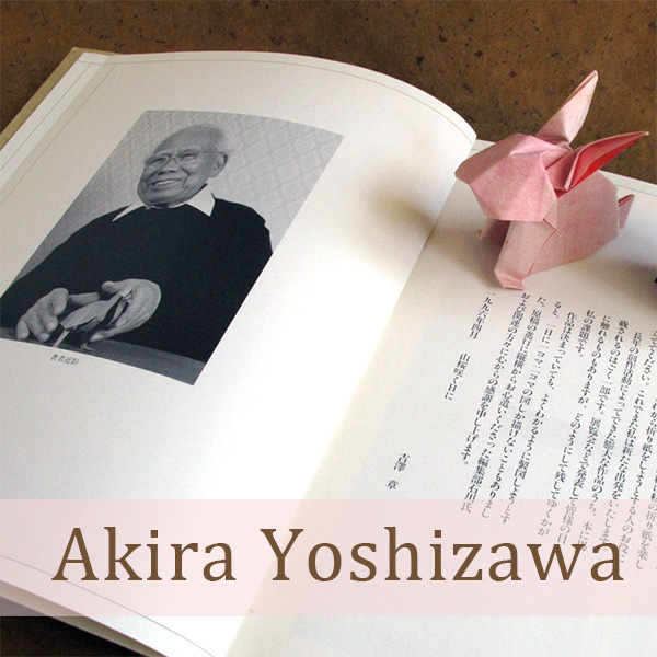 Photograph of Akira Yoshizawa, origami master and an origami rabbit, created by Yoshizawa and folded by Leyla Torres
