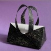 origami handbag or purse created by Hans-Werner Guth and Leyla Torres