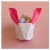 Origami Easter basket in the shape of a rabbit.