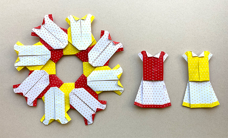 Origami Model of a red yellow white sun dress designed by Leyla Torres