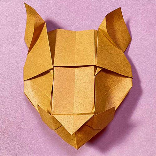 An origami model of of a Puma cat designed by Román Diáz
