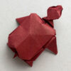 An origami model titled "Turtle" designed by Rodrigo Slazar