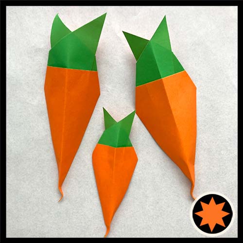 An origami model titled "Carrot" designed by Leyla Torres