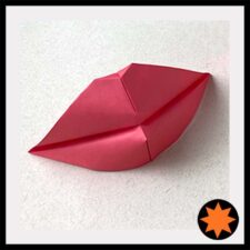 Origami Model of red Lips for Mona Lisa's Smile designed by Leyla Torres.