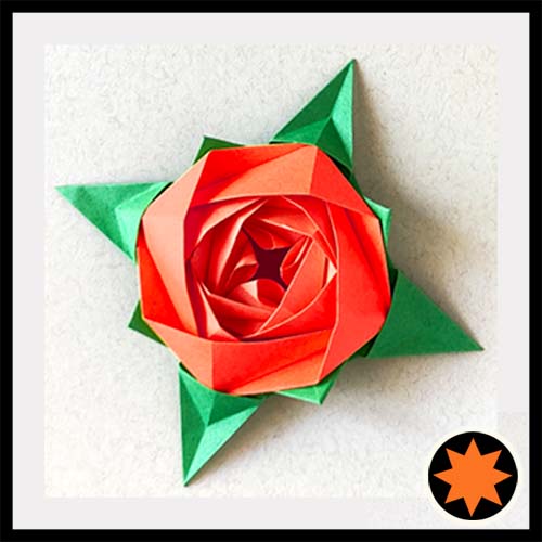 An Origami model titled "Rose in a Star." A variation on a traditional design by Leyla Torres