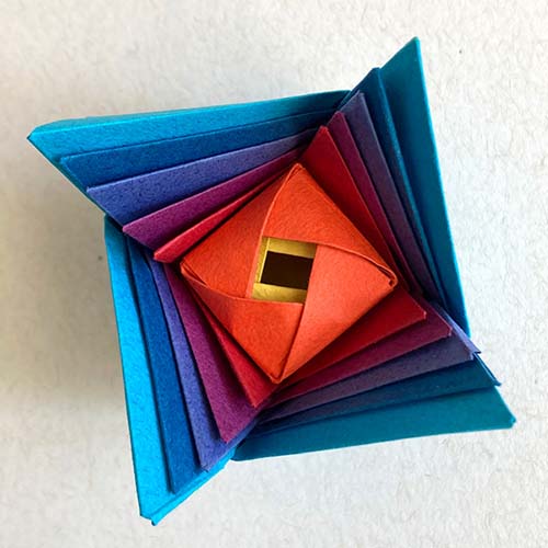An Origami model titled "Origami Star, a Box and a Cube (S.B.C)" A model design of Wenhau Chao.