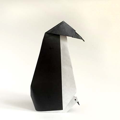 An Origami model titled "Penguin and Peep" A design of Ana Turner.